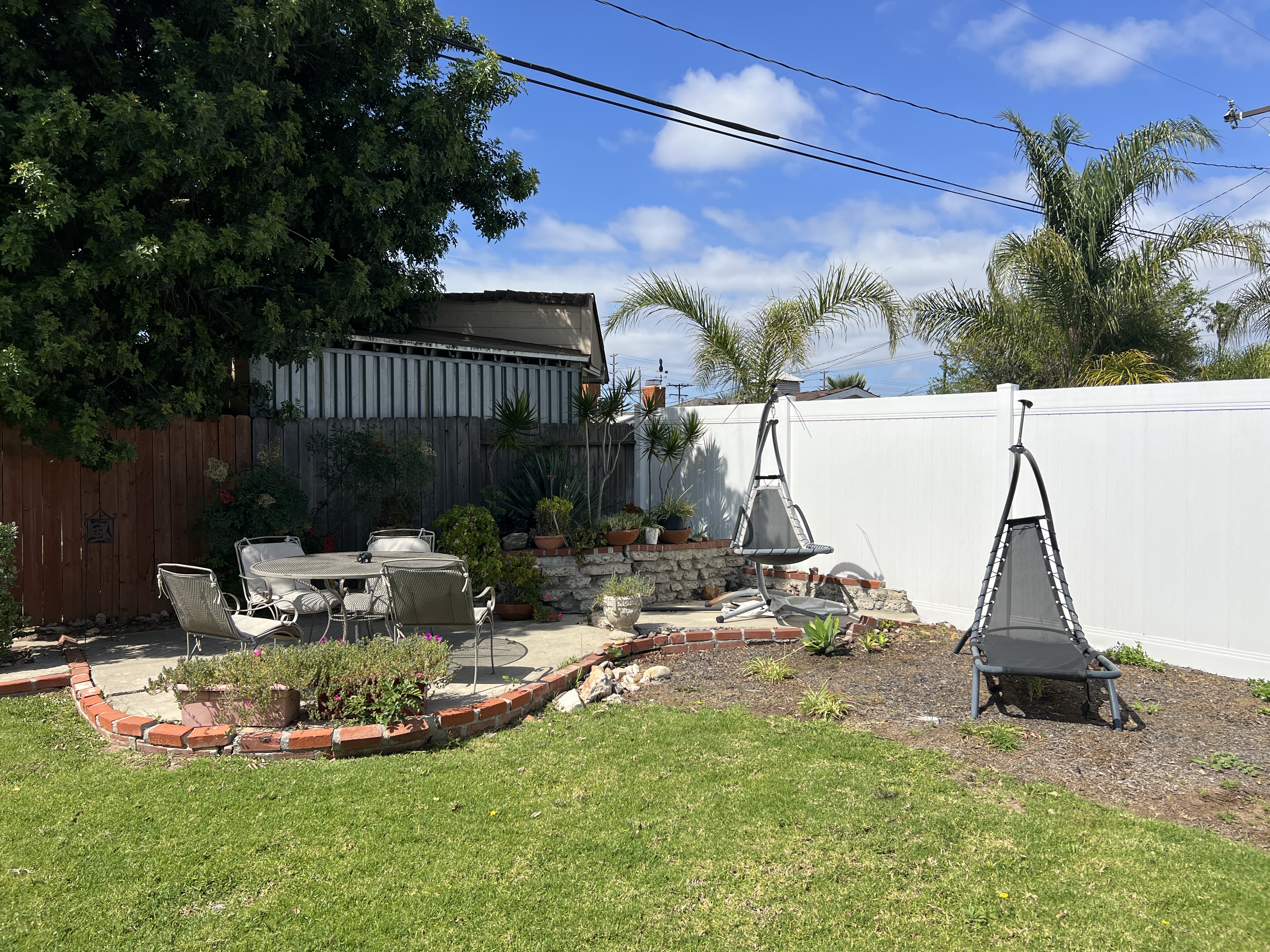 Backyard outdoor dining and swing