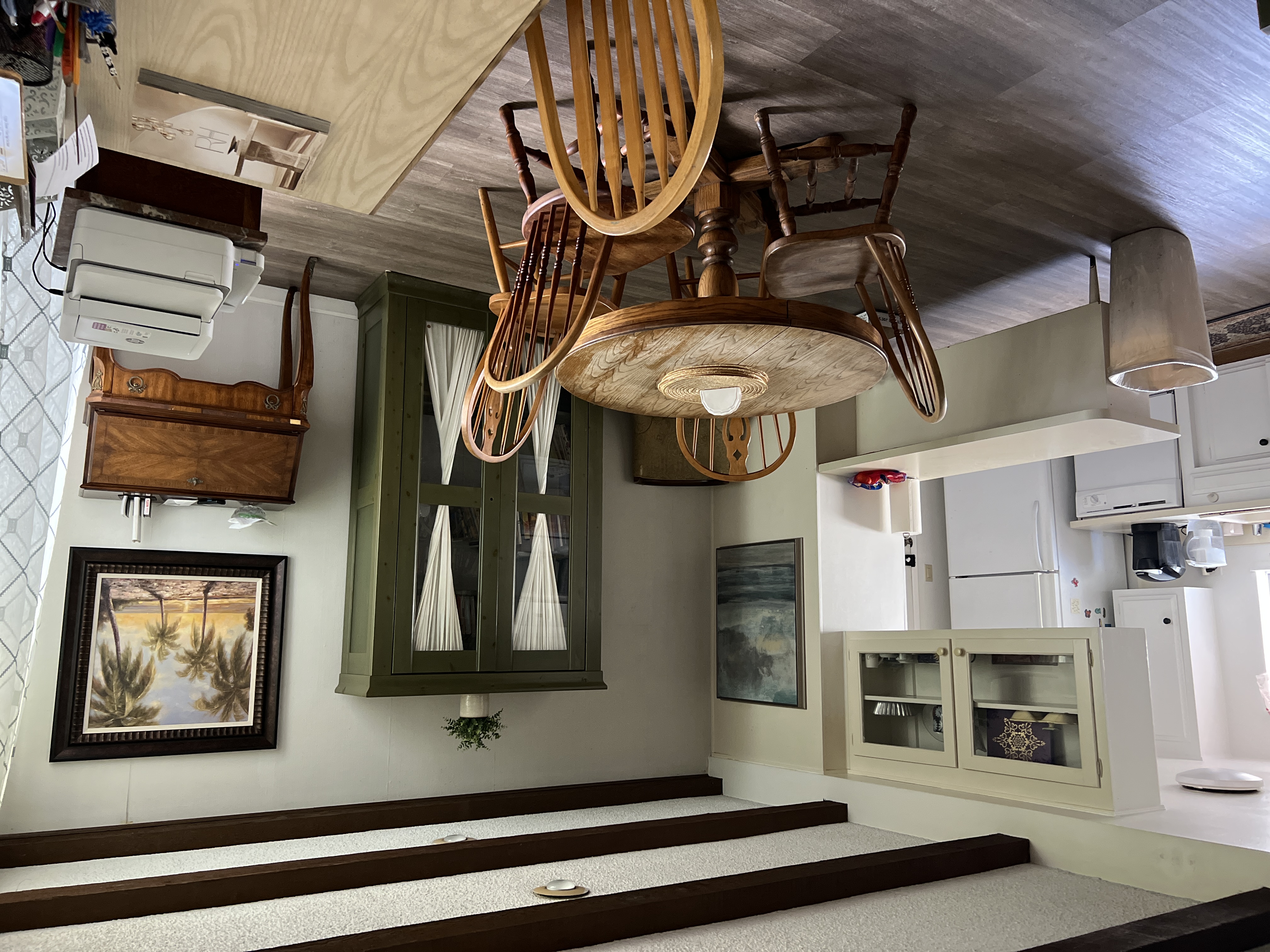 Dining area with table and kitchen